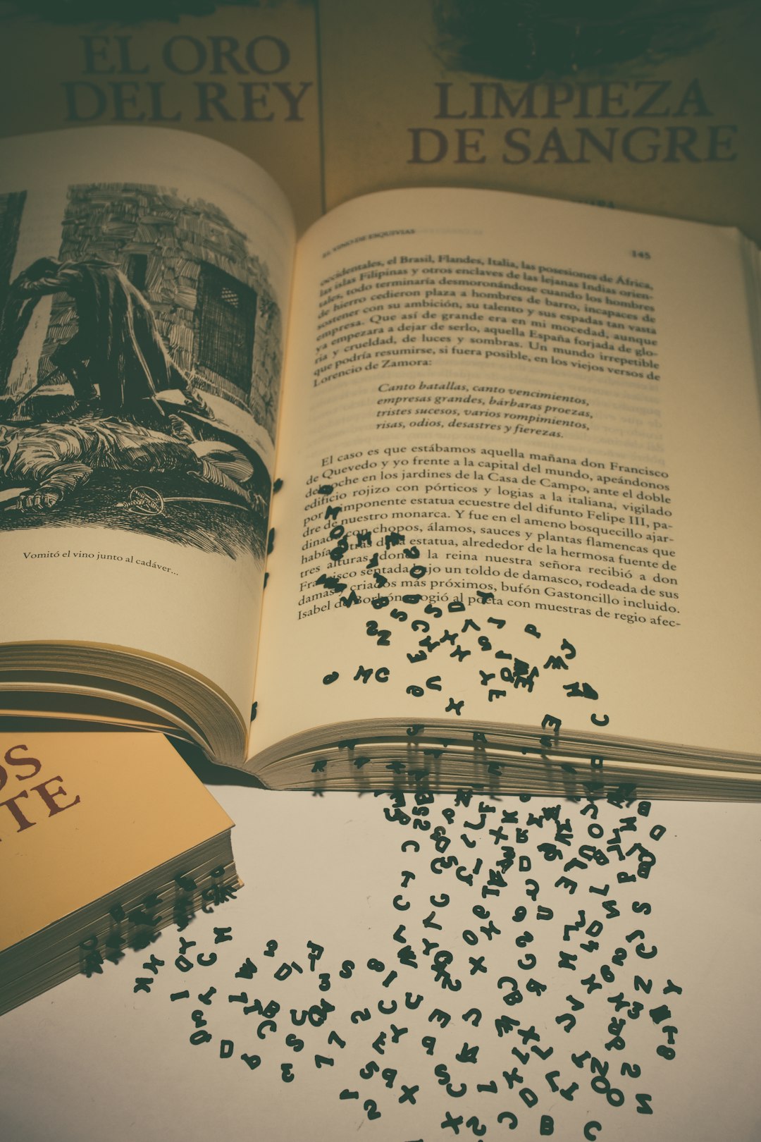 letters coming out of the book